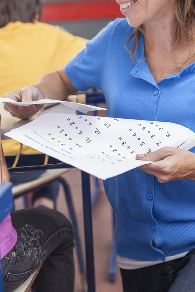 Teacher holding exam