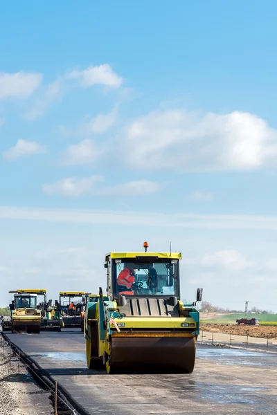 Road rollers working on the construction site