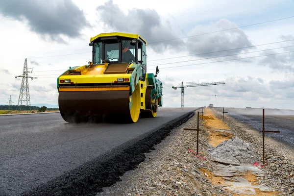 Road rollers working on the construction site