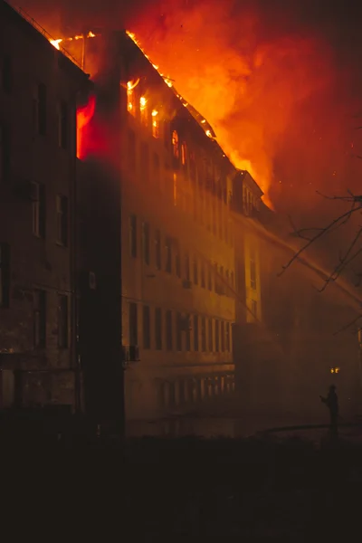 Building On Fire At Night