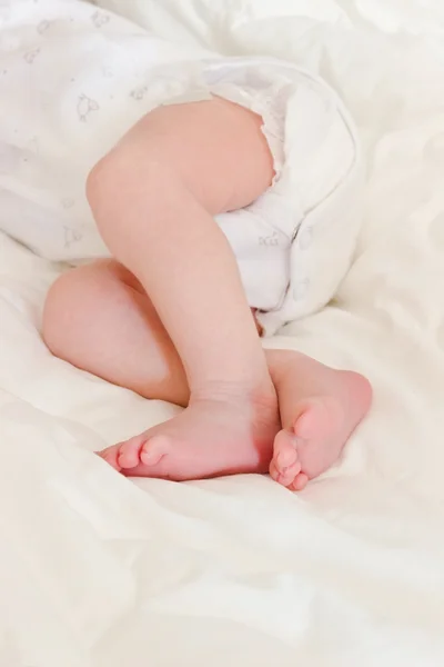 Little feet of newborn baby