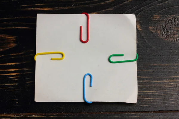 Paper clips on a white sheet