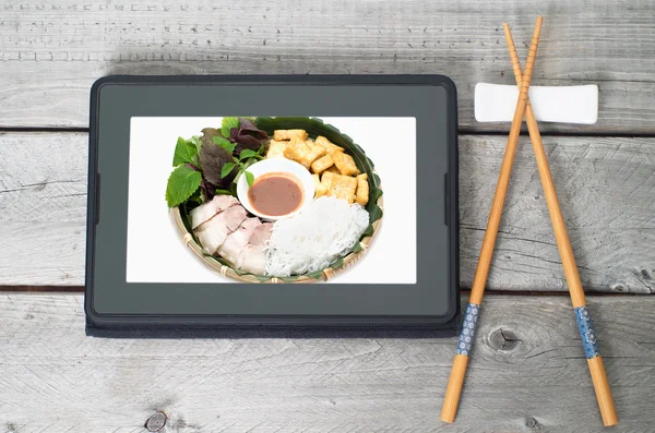 On-line and web asian food ordering concept with digital table a