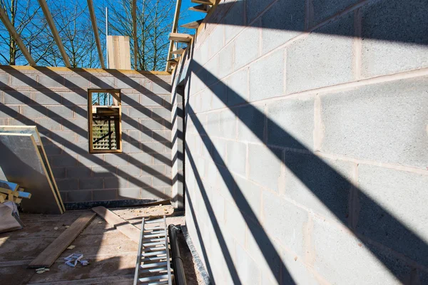 Construction work on a house.