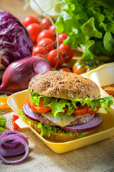 Tasty and fragrant hamburger meat in a healthy integral bread. W