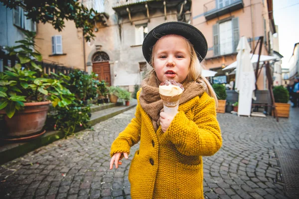 Little girl eaten ice cream
