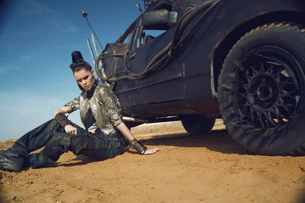 Woman warrior in  futuristic  clothes with car