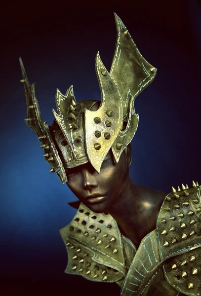 Mannequin in head wear and armour with spikes