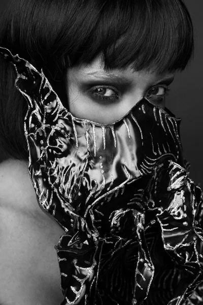 Female model in creative mask