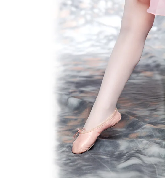 Little girl with pointe shoes