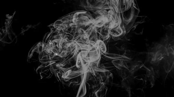 Abstract gray smoke from the incense sticks.