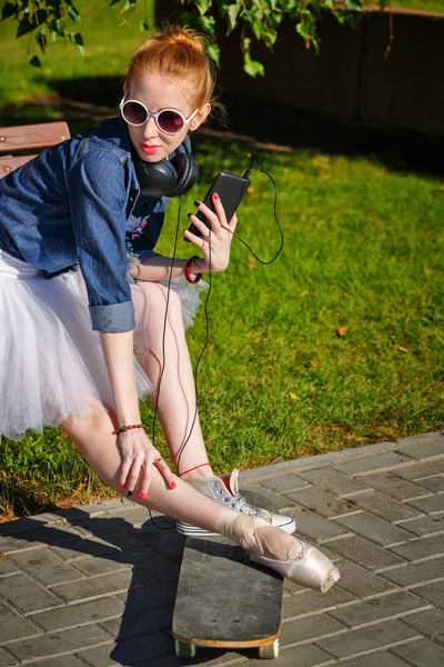Ballerina hipster sitting on the bench.