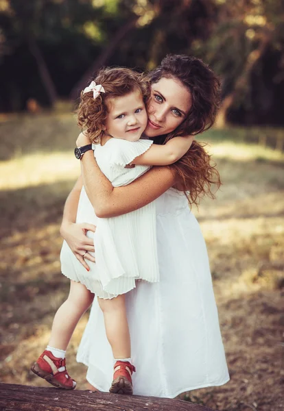 Mother and daughter walking