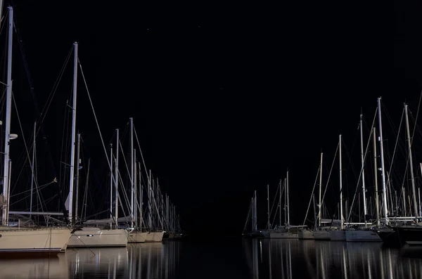 Night scene in a marina with moored yachts, in Lefkada island, Greece