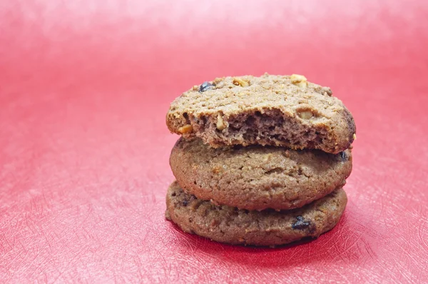 Chocolate chip cookie on red paper