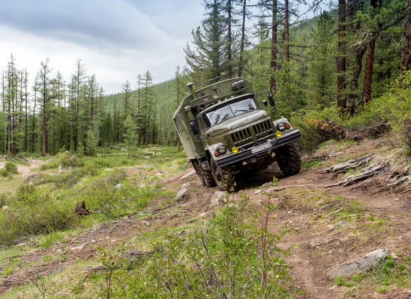 Russian truck Ural crossing a small river