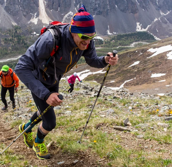 Trail runner, man and success in mountains. Running, sports