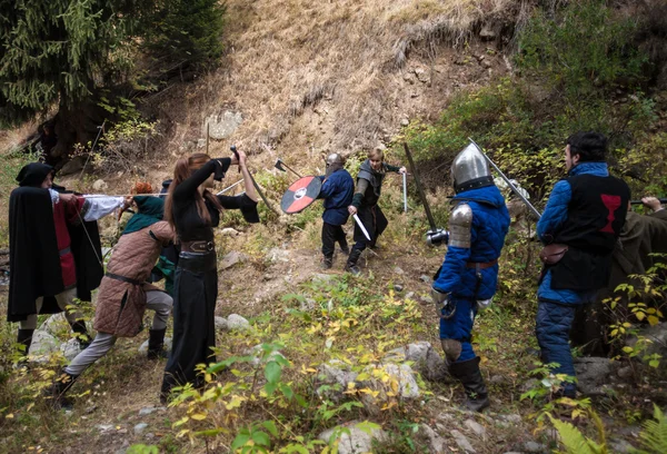 People play RPG games in nature era of the Middle Ages