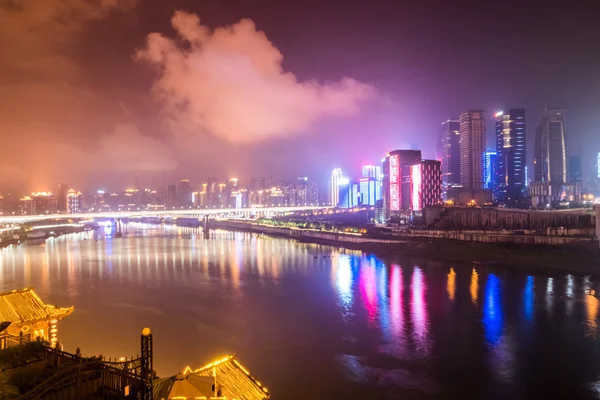 CHONGQING, CHINA - SEPTEMBER 11, 2016 :landmark of Chongqing, China cityscape at the Jialing River and Qianximen Bridge.