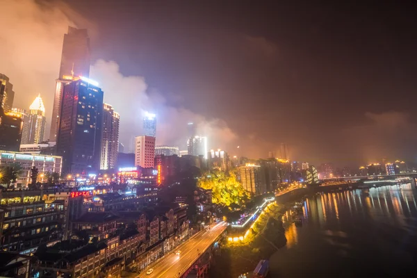 CHONGQING, CHINA - SEPTEMBER 11, 2016 :landmark of Chongqing, China cityscape at the Jialing River and Qianximen Bridge.