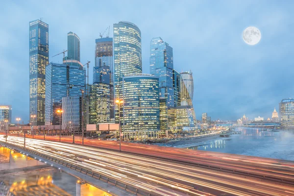 Cold winter morning view of the road and business city center.