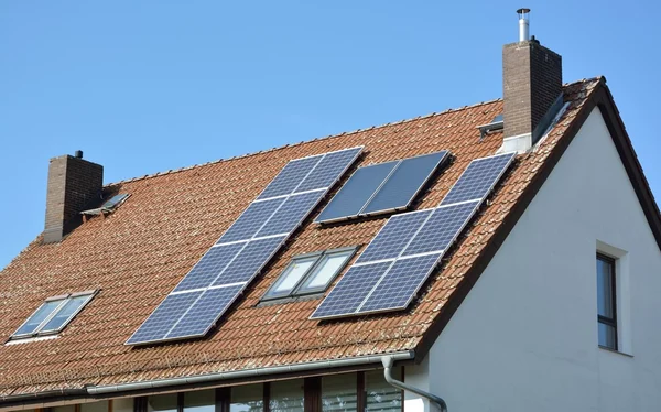 Solar energy panels on roof of house