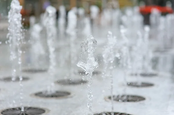 Rows of water jets in fountain