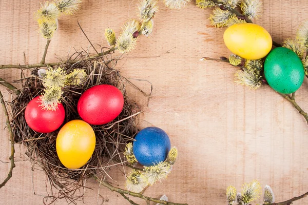 Easter eggs on the wooden table