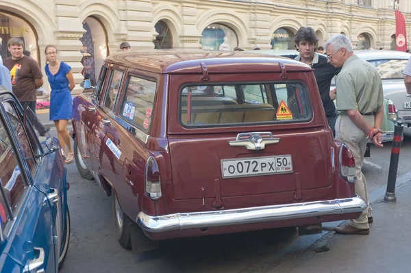 Car Volga GAZ-22 on retro rally Gorkyclassic about Gum, Moscow, rear view