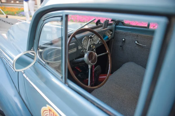 Soviet car Moskvich-401 on retro rally Gorkyclassic about Gum, Moscow, cabin