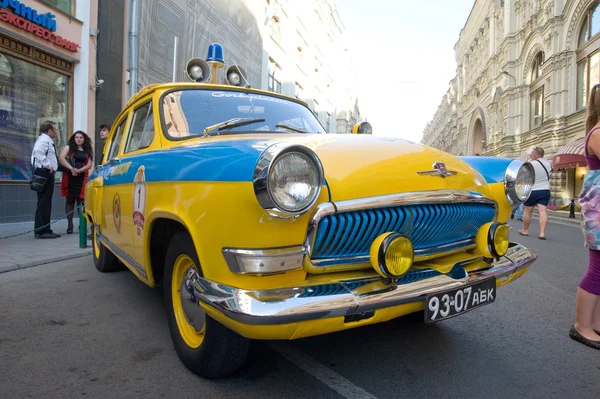 Soviet police retro car Volga GAZ-21 rally Gorkyclassic, near Gum Department store, Moscow, front view