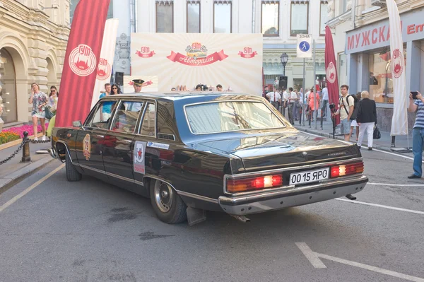 Soviet retro car Chaika  GAZ-14 retro rally Gorkyclassic near Gum Department store, Moscow, rear view