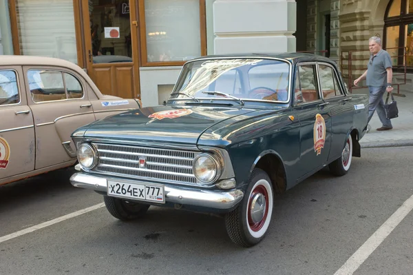 Soviet car Moskvich-408 on retro rally Gorkyclassic,  GUM, Moscow