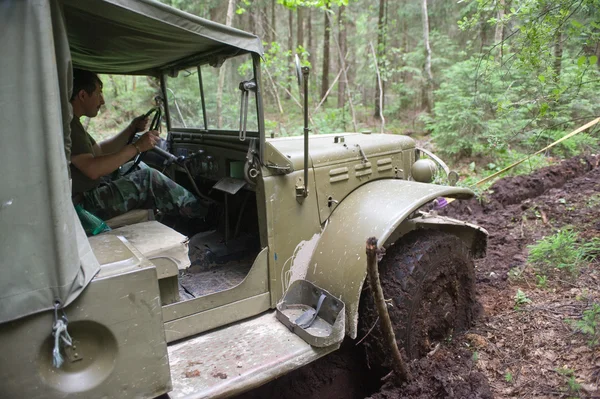U.S. army Dodge WC-51 stuck in the woods on a heavy road, 3rd international meeting 