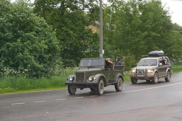Old Soviet car GAZ-69 goes on the road,  3rd international meeting \