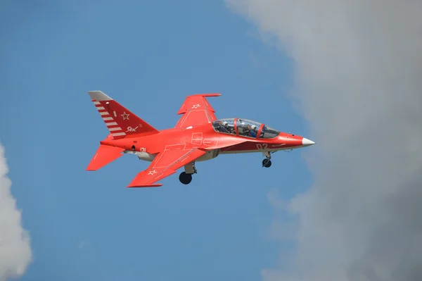 International aviation and space salon MAKS-2013. Flight of the new Russian red combat training aircraft Yak-130 with the gear