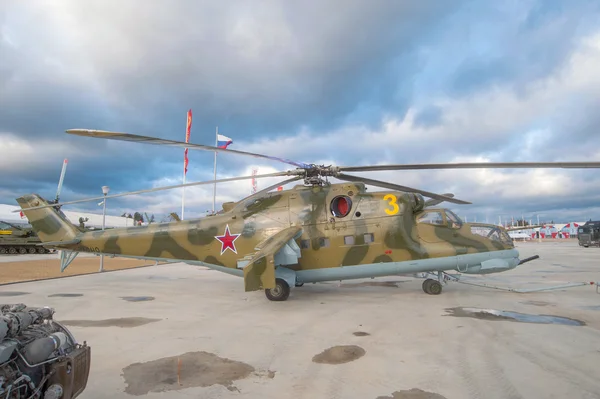 Modern Russian military helicopter Mi-24 in the Parking lot at Patriot Park, side view