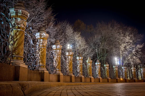 Night view of the fence of the Mikhailovsky Garden in the temple of Savior on Spilled Blood, St.Petersburg, Russia