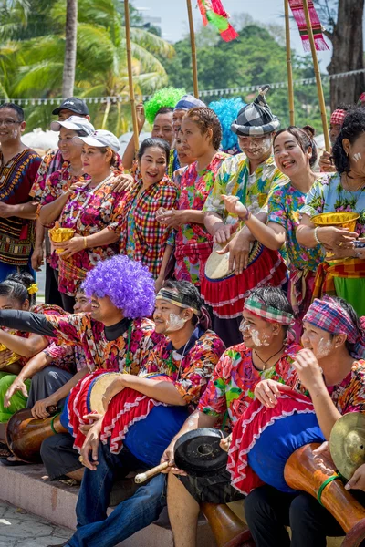 PHUKET, THAILAND - APRIL 13, 2016: Unidentified traditionally dressed people at the street side preparing to Songkran Festival, celebrated in a traditional New Year\'s Day.