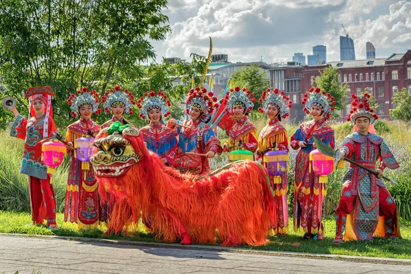 Moscow, Russia - July 31, 2016: the performance of the Chinese show Golden Dragon Drumpst in the open air during the celebration of the international tiger day in Moscow.