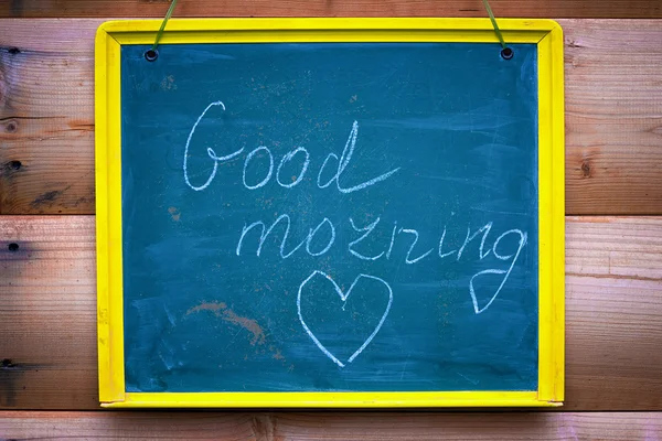 Inscription good morning and heart shape on a chalk board