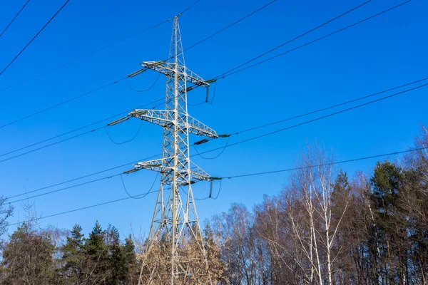 High-voltage tower in a sunny day