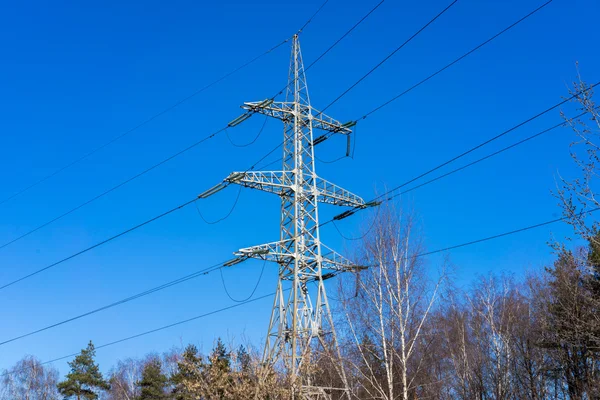 High-voltage tower in a sunny day