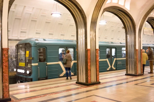 MOSCOW - 21 MARCH 2015: People in Mayakovskaya Metro Station in 21 March 2015. With a population of more than 11 million people is one the largest cities in the world and a popular destination.