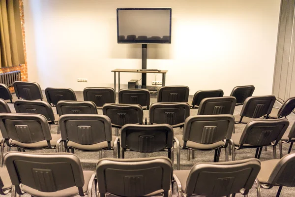 Screen in empty conference hall