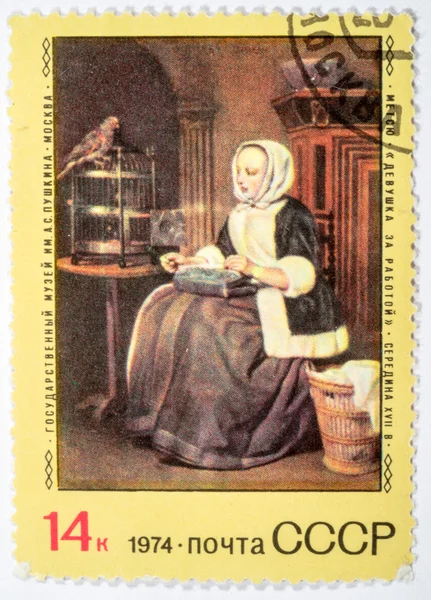 Moscow, Russia - October 3, 2015: A stamp printed by USSR shows painting Girl at Work by Gabriel Metsu -Dutch painter of history paintings, still lifes, portraits and exquisite genre works, circa 1974