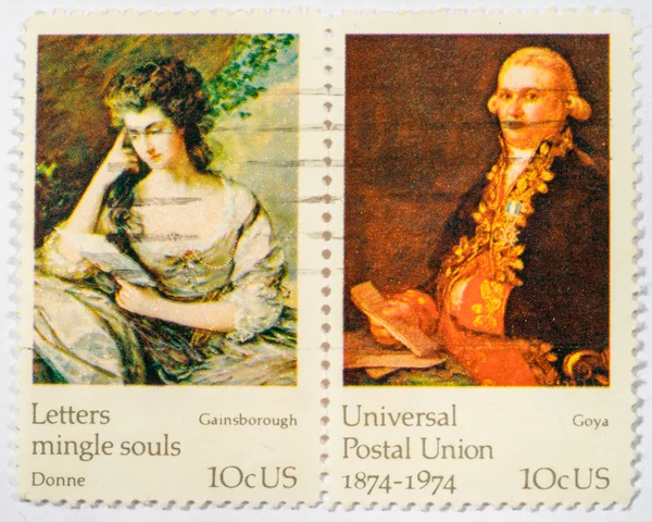 US - CIRCA 1974: A double stamps printed in US shows paintings by Goya and Gainsbourough, ceries FAMOUS WORKS OF ART, the 100th anniversary of the Universal Postal Union. circa 1974.