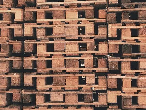 Outside stock of old manufactured wooden standard euro pallets