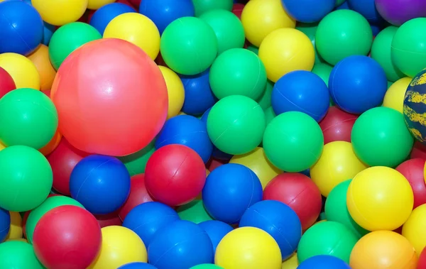 Toy rubber balls background. Balls for children in the children