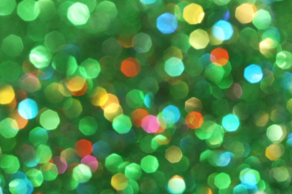 Dark abstract green, red, yellow, turquoise glitter background christmas tree-abstract background